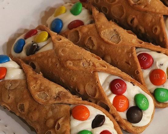 Order M&M  Chocolate Chip Cannoli food online from Italian Village Pizza store, Lansing on bringmethat.com