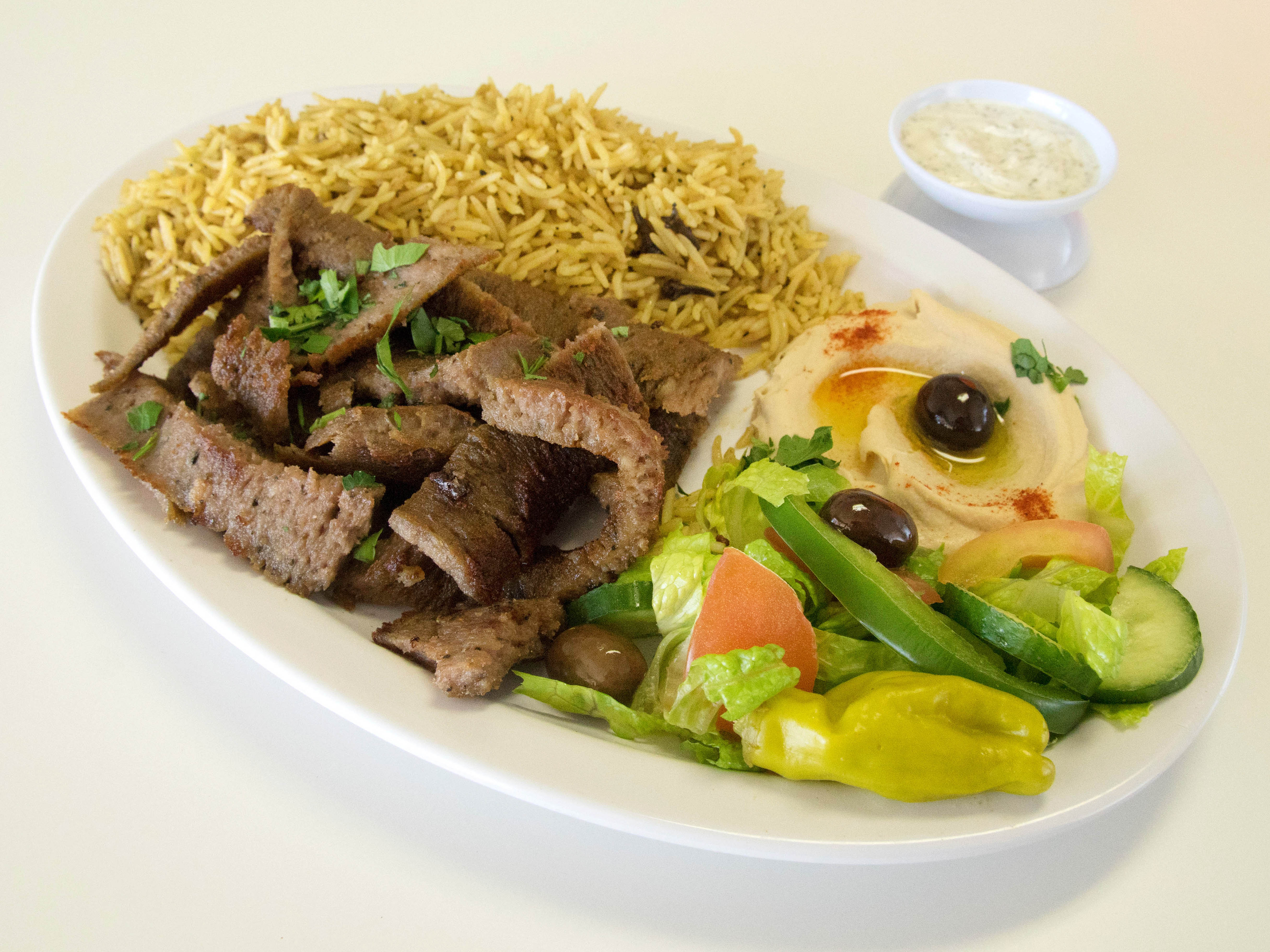 Order Gyros Plate food online from Shawarma Xpress store, San Diego on bringmethat.com