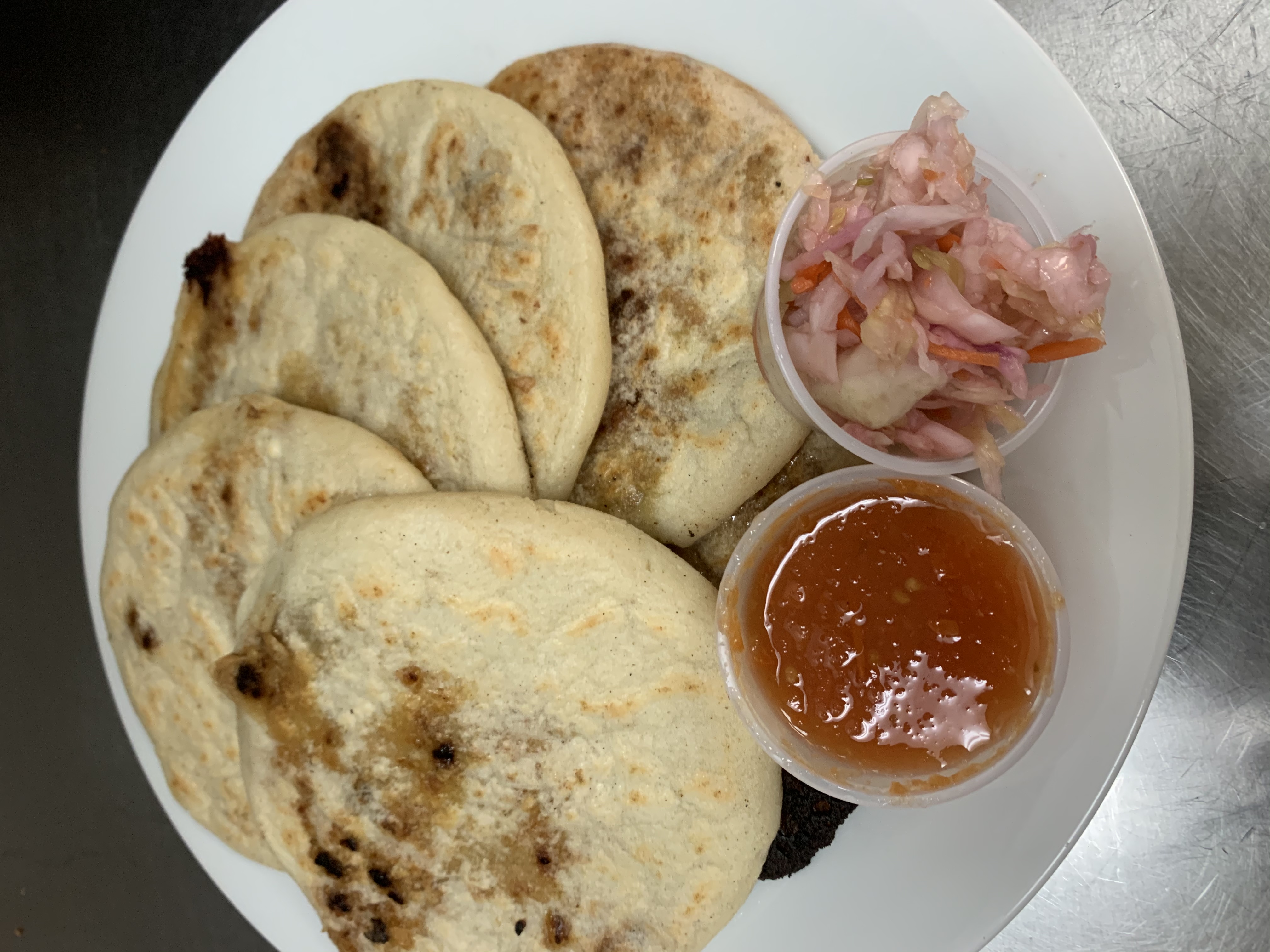 Order G3. Pork and Cheese Pupusa food online from Guana Cafe store, Irving on bringmethat.com