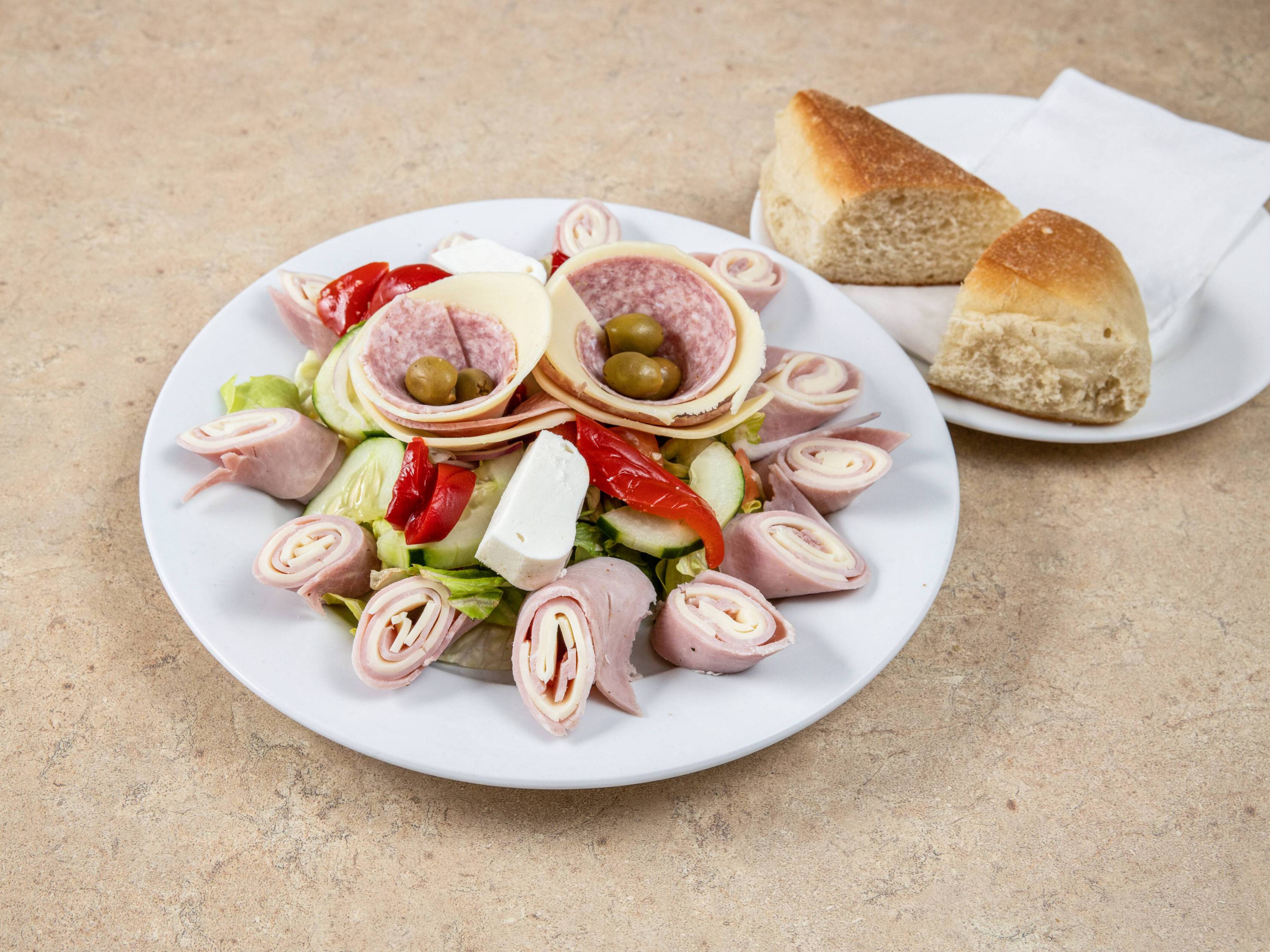 Order Antipasto Salad food online from Frank's Trattoria store, Caldwell on bringmethat.com