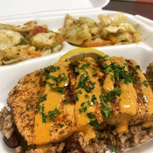 Order Blackened Salmon Served on Rice & Peas food online from Trap Fusion store, Cordova on bringmethat.com