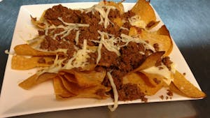 Order 76. Nachos with Beef food online from La Tolteca store, Williamsburg on bringmethat.com