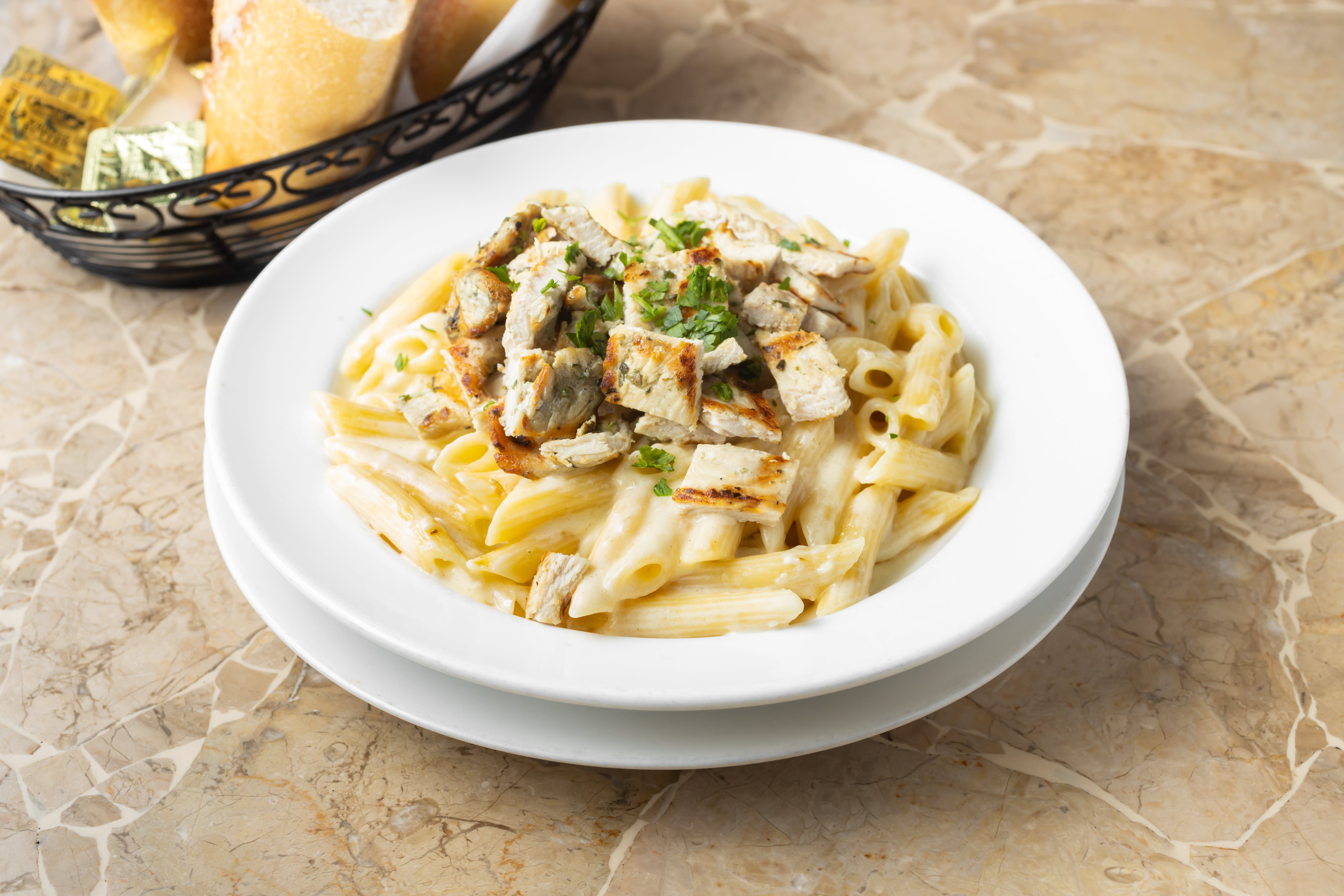 Order Penne Alfredo Sauce with Grilled Chicken - Pasta food online from Oasis restaurant store, Sunnyside on bringmethat.com