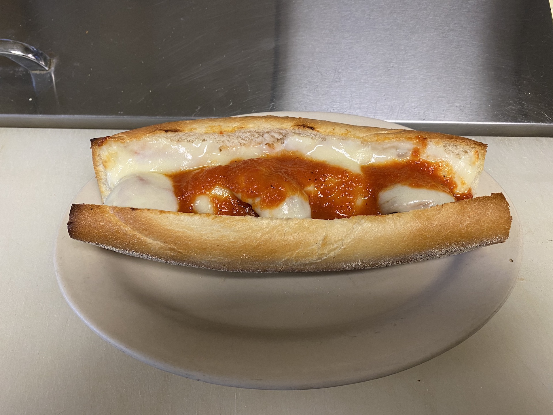 Order Baked Meatball Parm Sandwich food online from Capri Pizza & Restaurant store, Plumsteadville on bringmethat.com