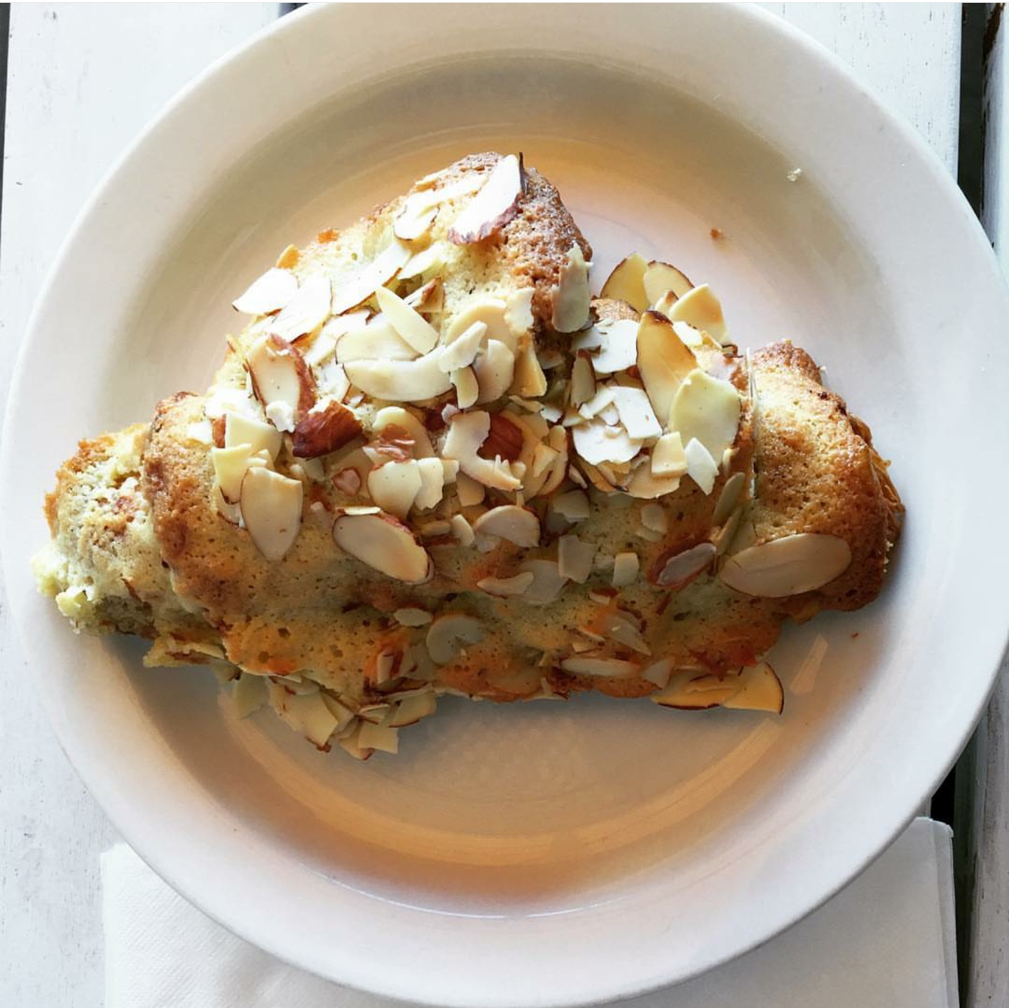Order Almond Croissant food online from Amandine Patisserie Cafe store, Los Angeles on bringmethat.com