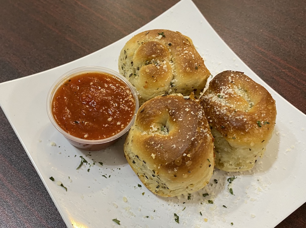 Order 4 Pieces Garlic Knots food online from Heavenly Crust Pizza store, North Richland Hills on bringmethat.com
