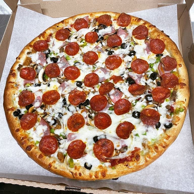 Order Deluxe Pizza - Small 10" food online from Firestone Pizza store, Houston on bringmethat.com
