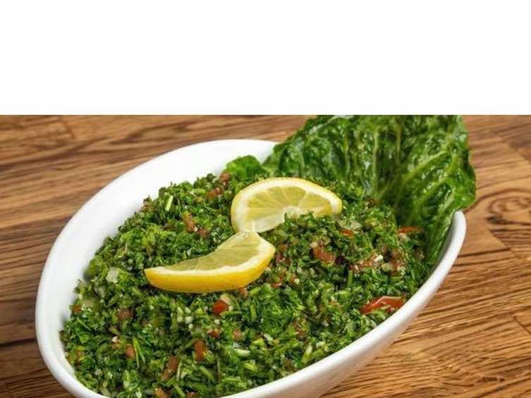Order Large Tabouli food online from Oasis Fresh store, Chicago on bringmethat.com