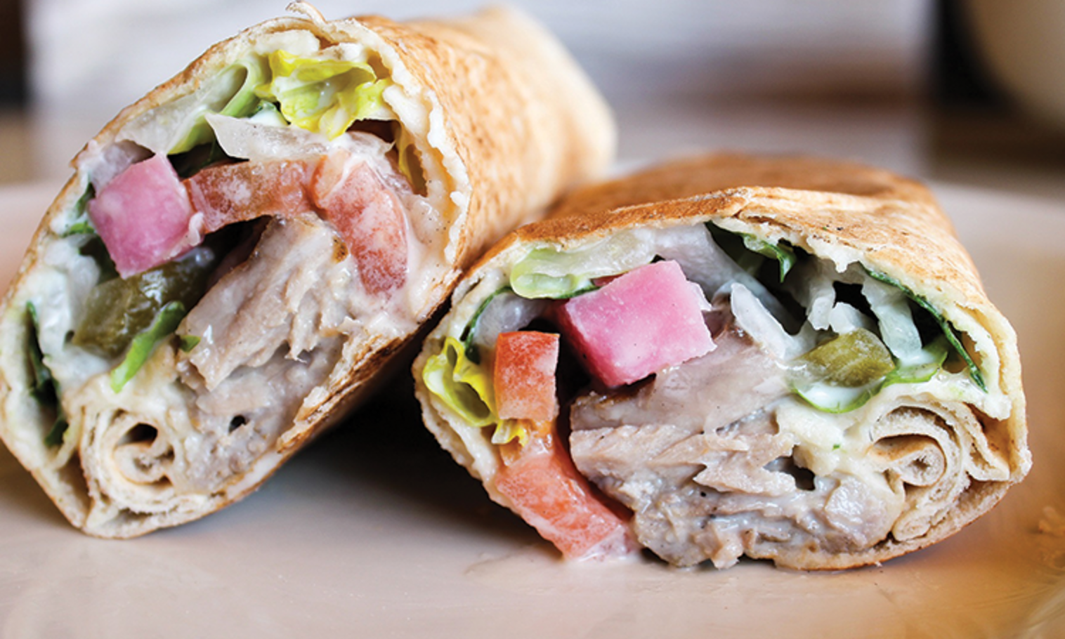Order Tuna Shawarma Rolled food online from Aladdins eatery store, Akron on bringmethat.com