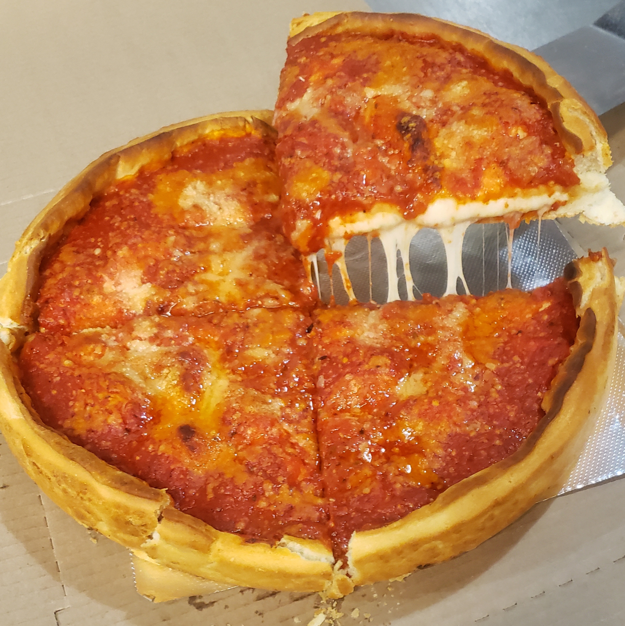Order Stuffed Cheese Pizza food online from Village Pizza store, Chicago on bringmethat.com