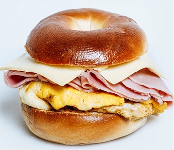 Order 1. Ham, Eggs and Cheese Bagel food online from Dc Cafe Donuts store, Reseda on bringmethat.com