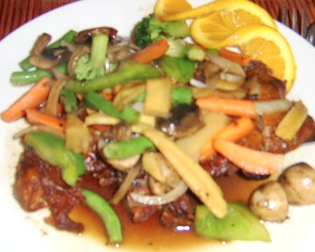 Order Roasted Duck with Vegetables food online from Tamarind Thai Restaurant store, Philadelphia on bringmethat.com