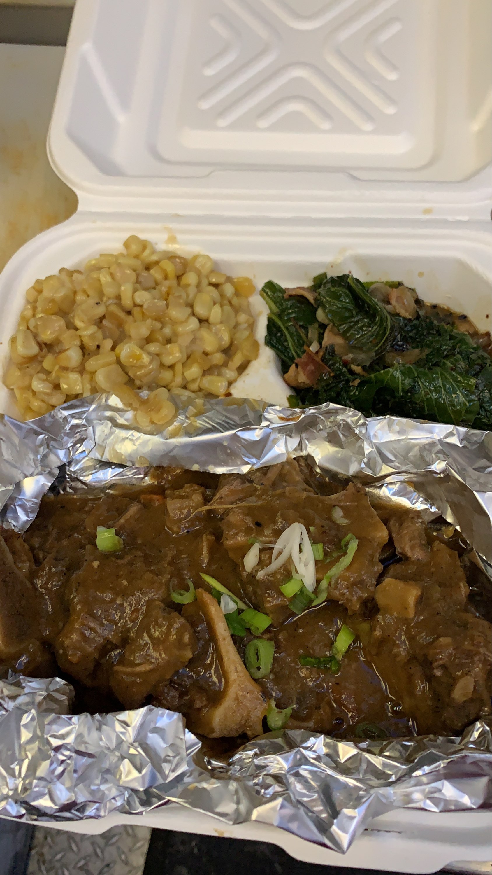 Order Braised oxtail with Brown Gravy food online from Everything Between Bunzz store, Oakland on bringmethat.com