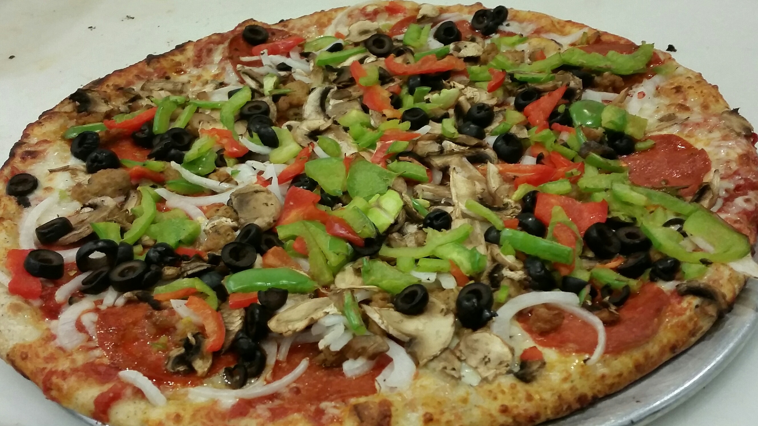 Order Combo Pizza food online from Pizanos Pizza store, Reno on bringmethat.com