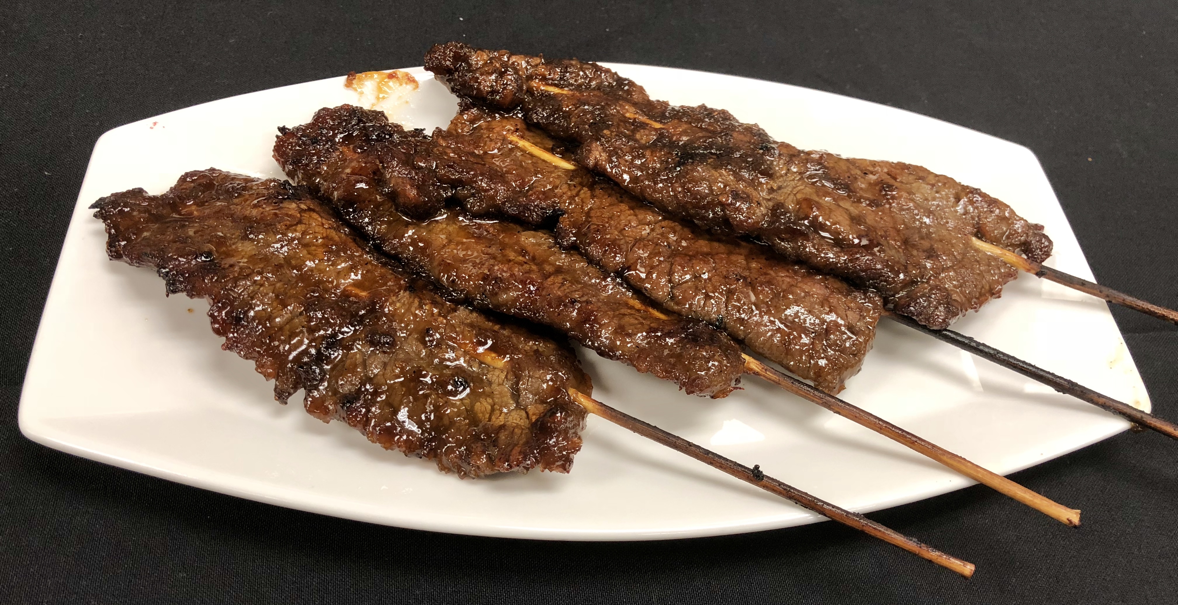 Order 5 Pieces Beef Skewers food online from Feng Shui Kitchen store, Waltham on bringmethat.com