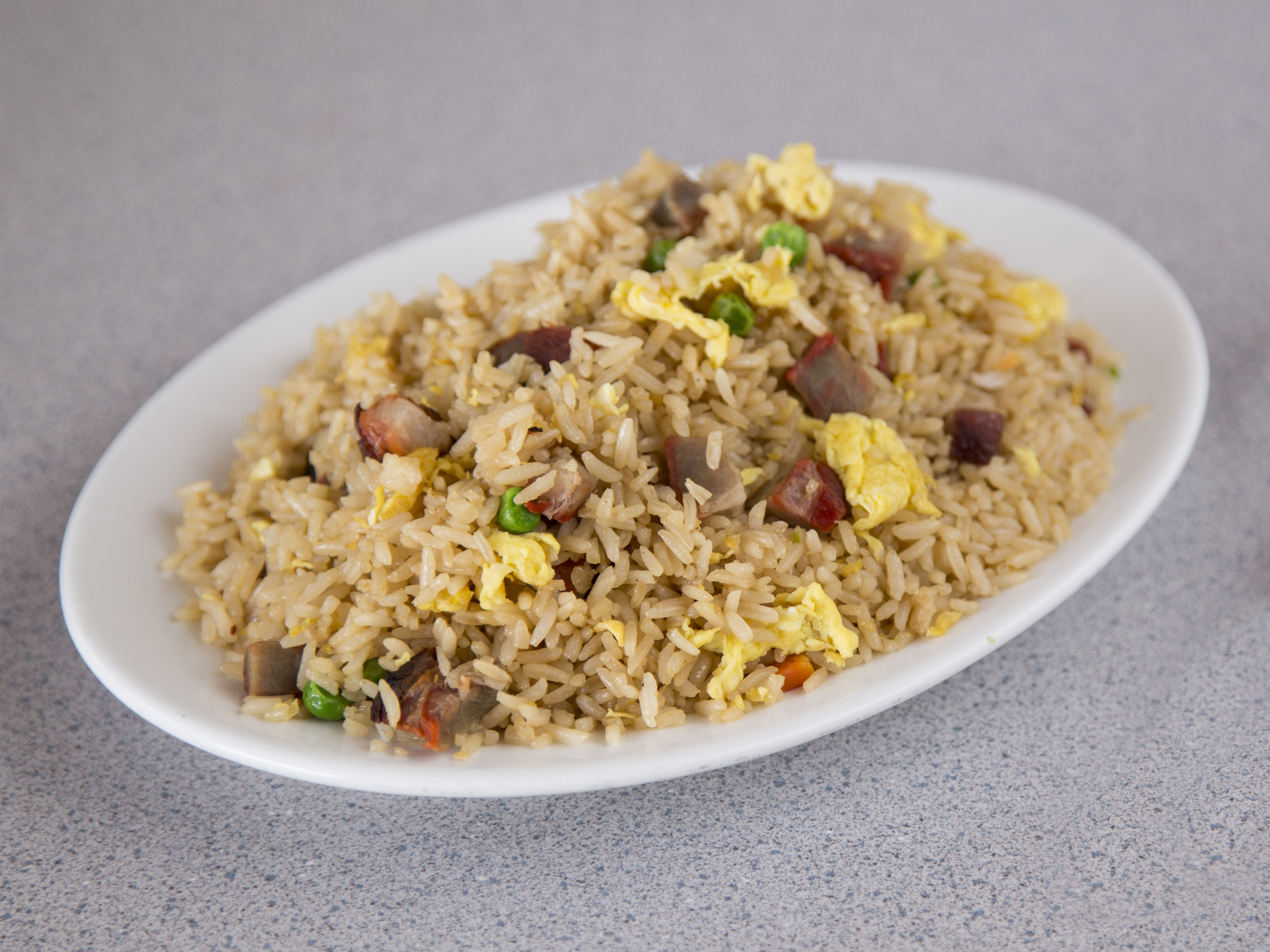 Order 1. Large BBQ Pork Fried Rice food online from Taste Of China store, Gilbert on bringmethat.com