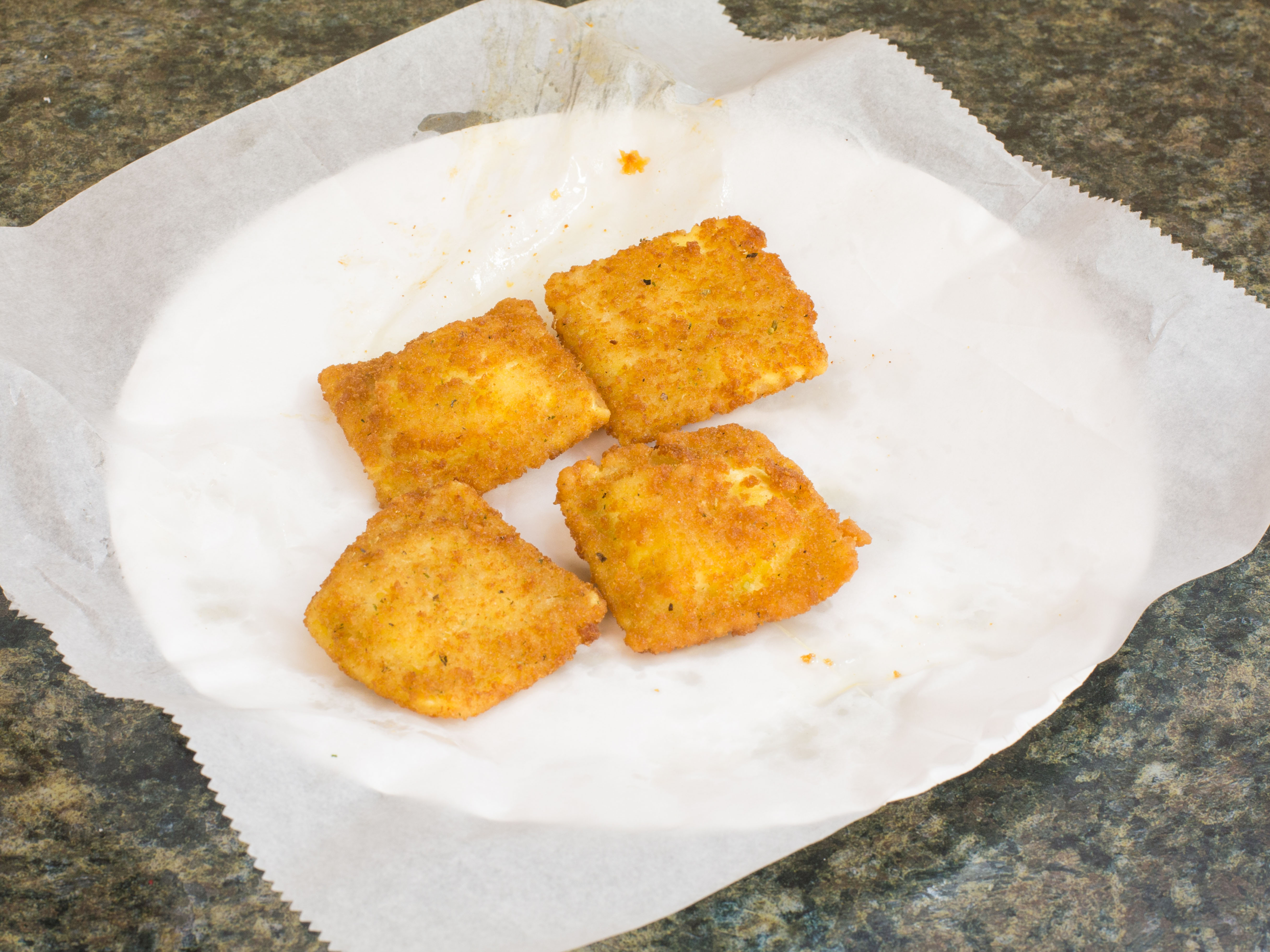 Order 6 Piece Fried Ravioli food online from Kennedy Pizza & Fried Chicken store, Newark on bringmethat.com