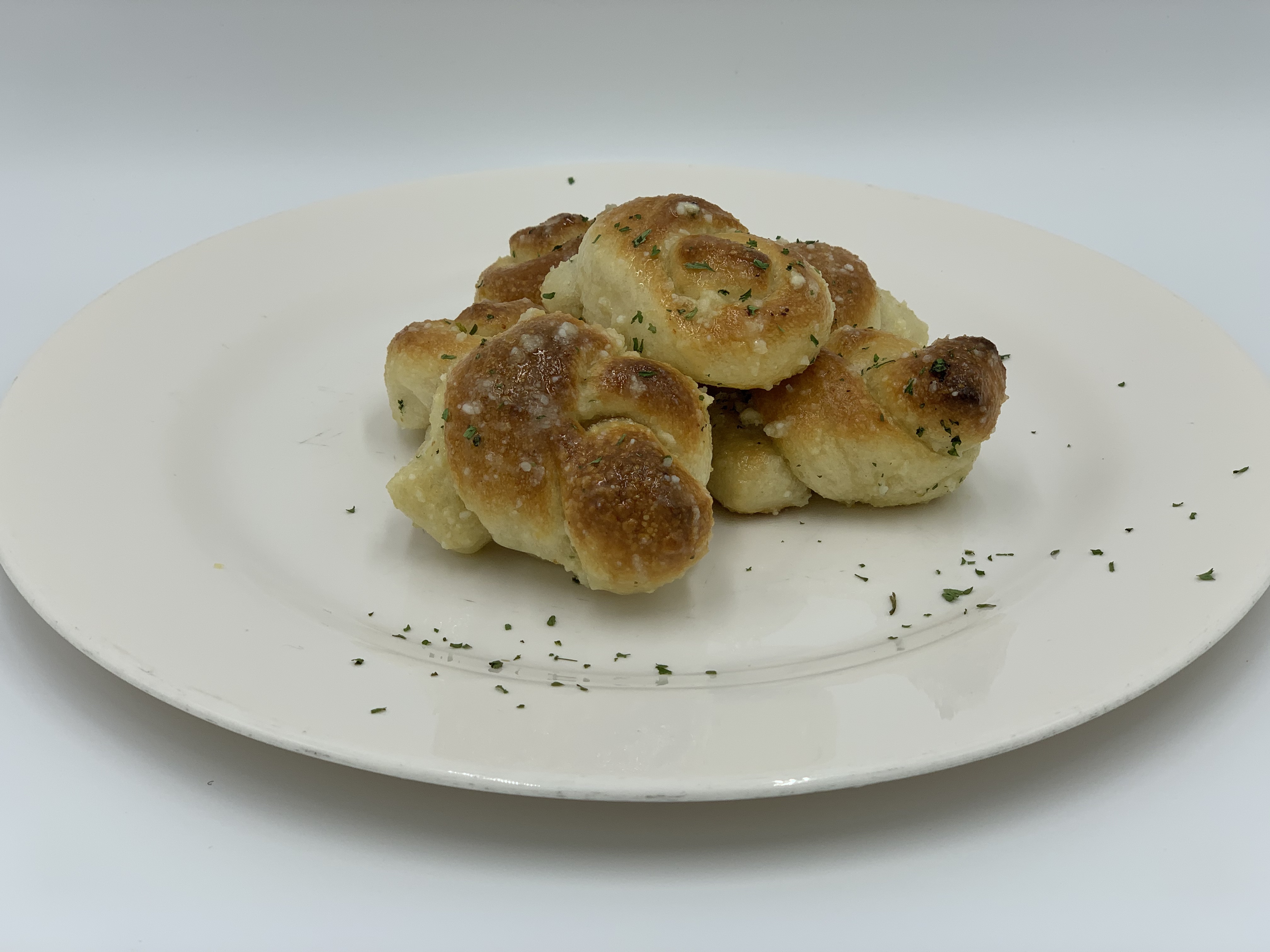 Order Garlic Knots food online from Mario's Pizzeria of Seaford store, Seaford on bringmethat.com