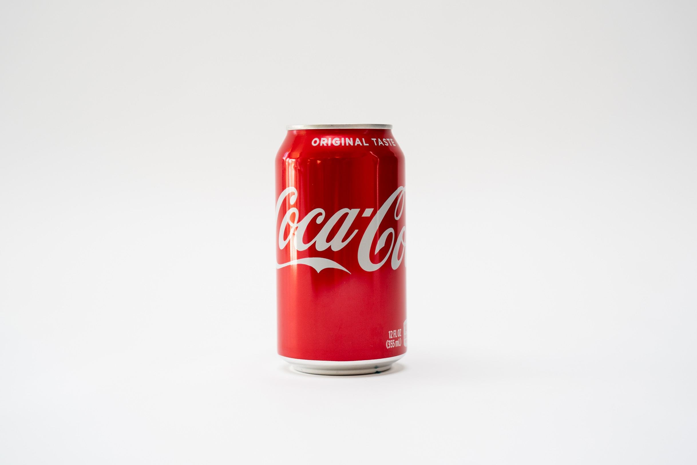 Order Can Coke food online from Thai Peacock store, Portland on bringmethat.com