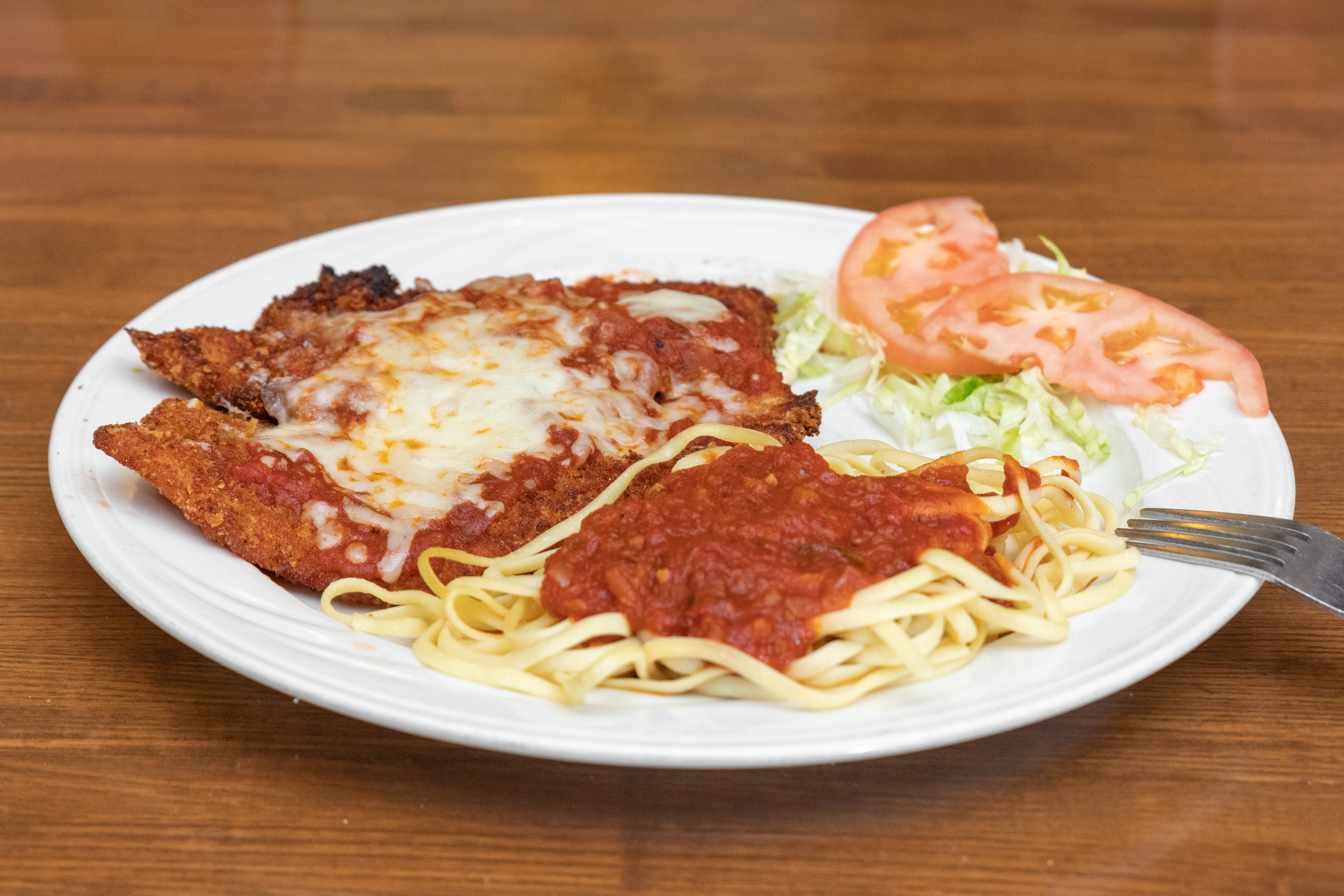 Order Chicken Parmigiana - Entree food online from Pizza Palace store, Fairfield on bringmethat.com