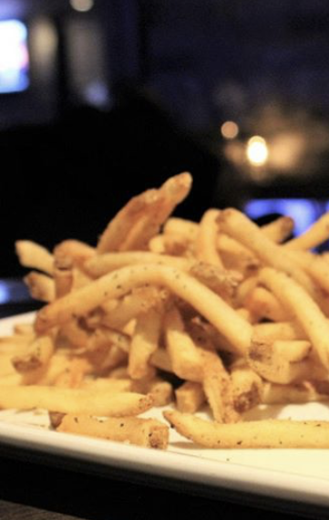 Order French Fries food online from Gaslight Bar & Grille store, Chicago on bringmethat.com