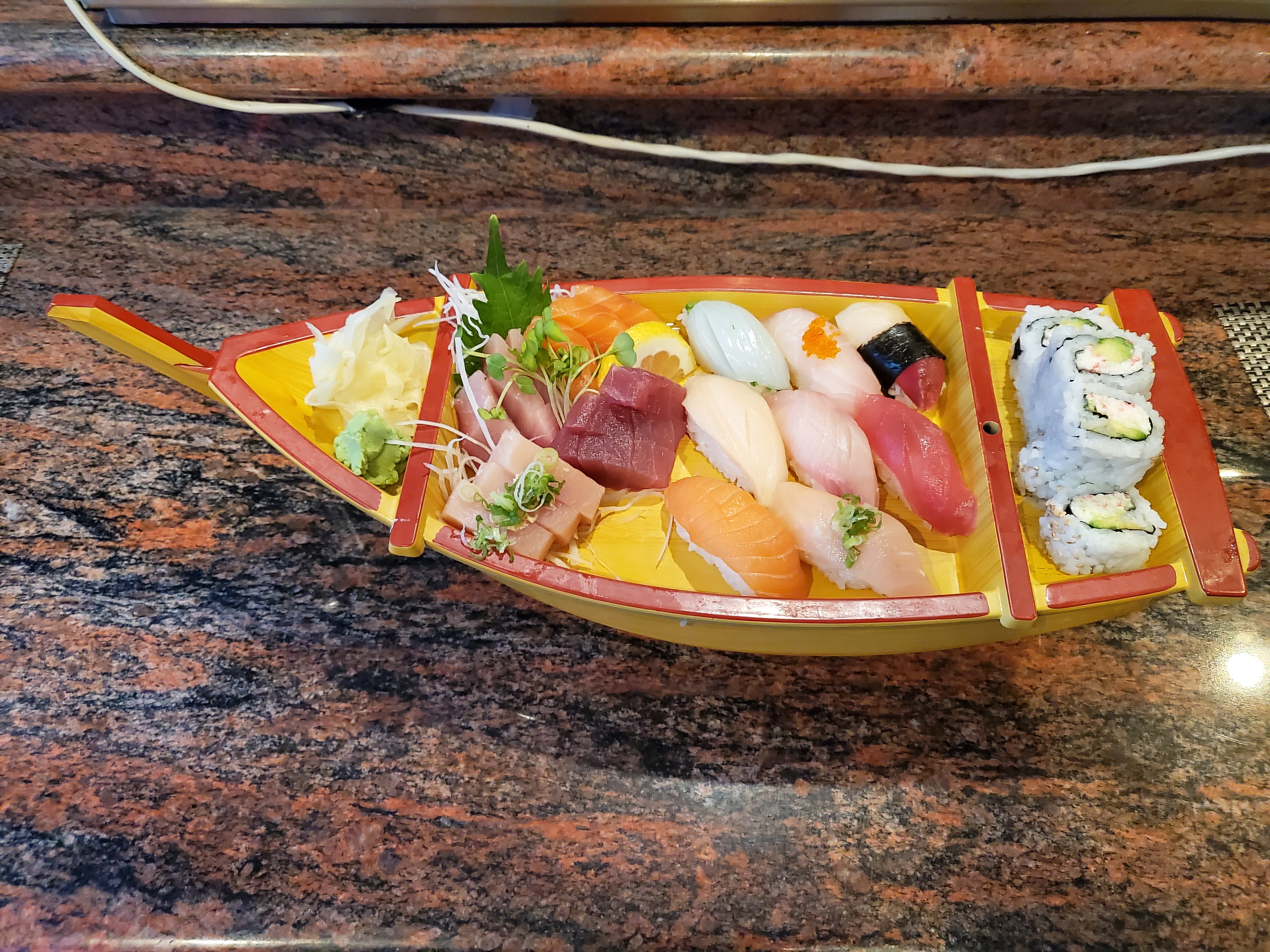 Order Sushi and Sashimi Deluxe food online from Sushi Toni store, San Francisco on bringmethat.com