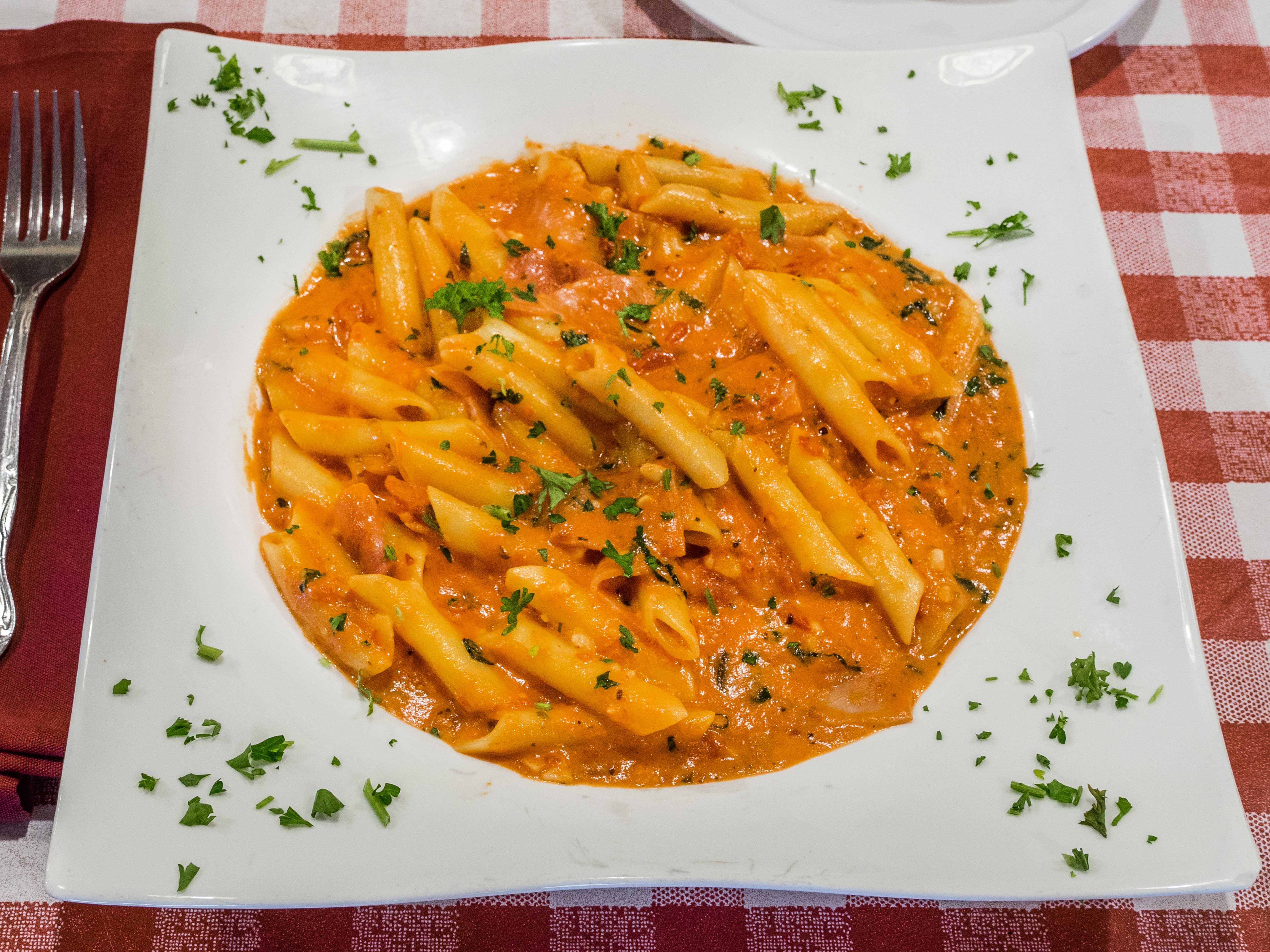 Order Penne Alla Auggie's food online from Augustino Italian Restaurant store, Garden Grove on bringmethat.com