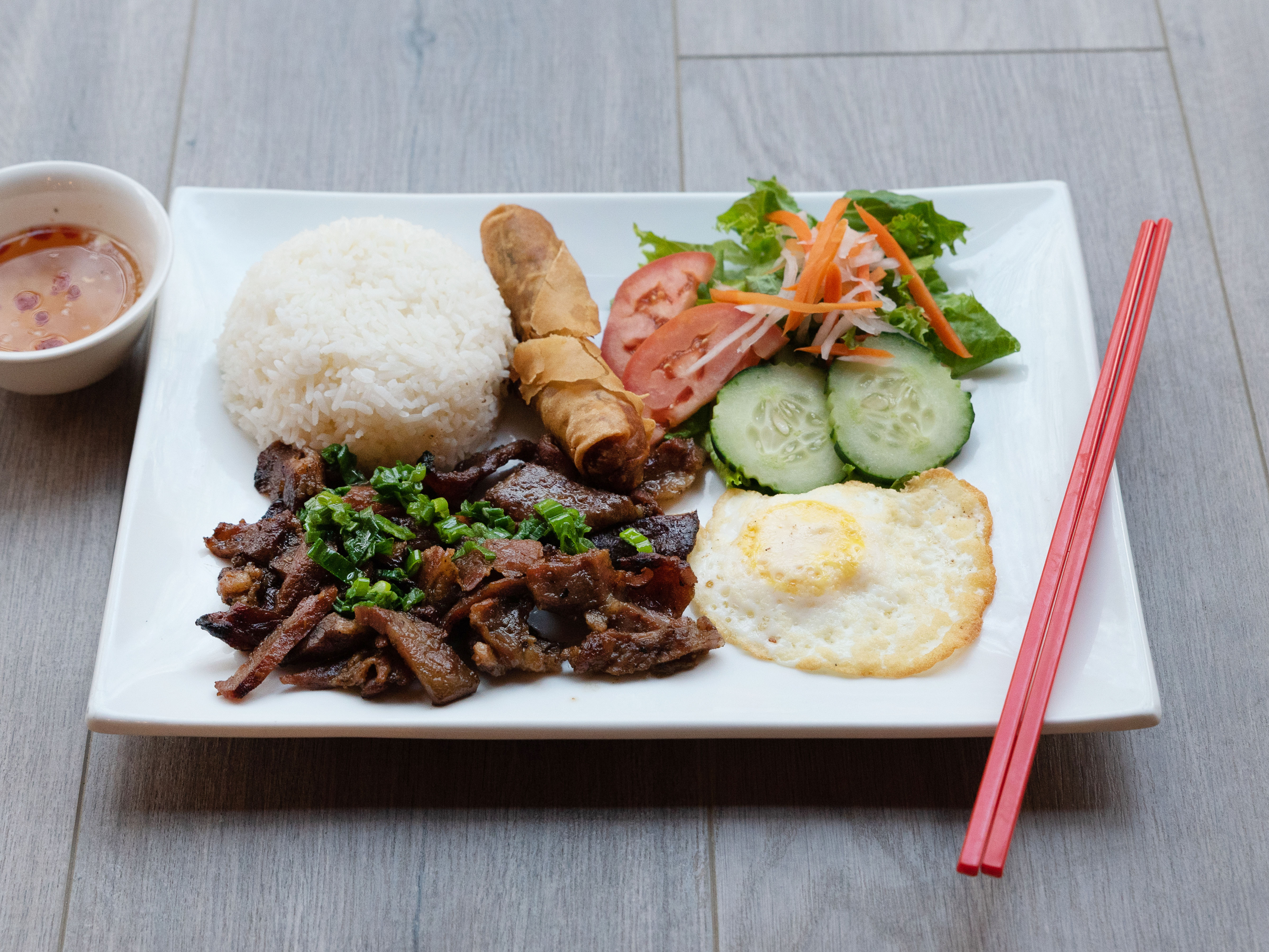 Order 1. Charbroiled Grilled Pork over Rice food online from i5 Pho Seattle store, Seattle on bringmethat.com