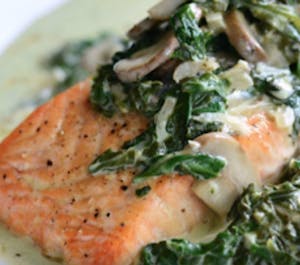Order Entrée - Creamy Tuscan Salmon food online from Fromage Wine And Cheese Bar store, Boston on bringmethat.com