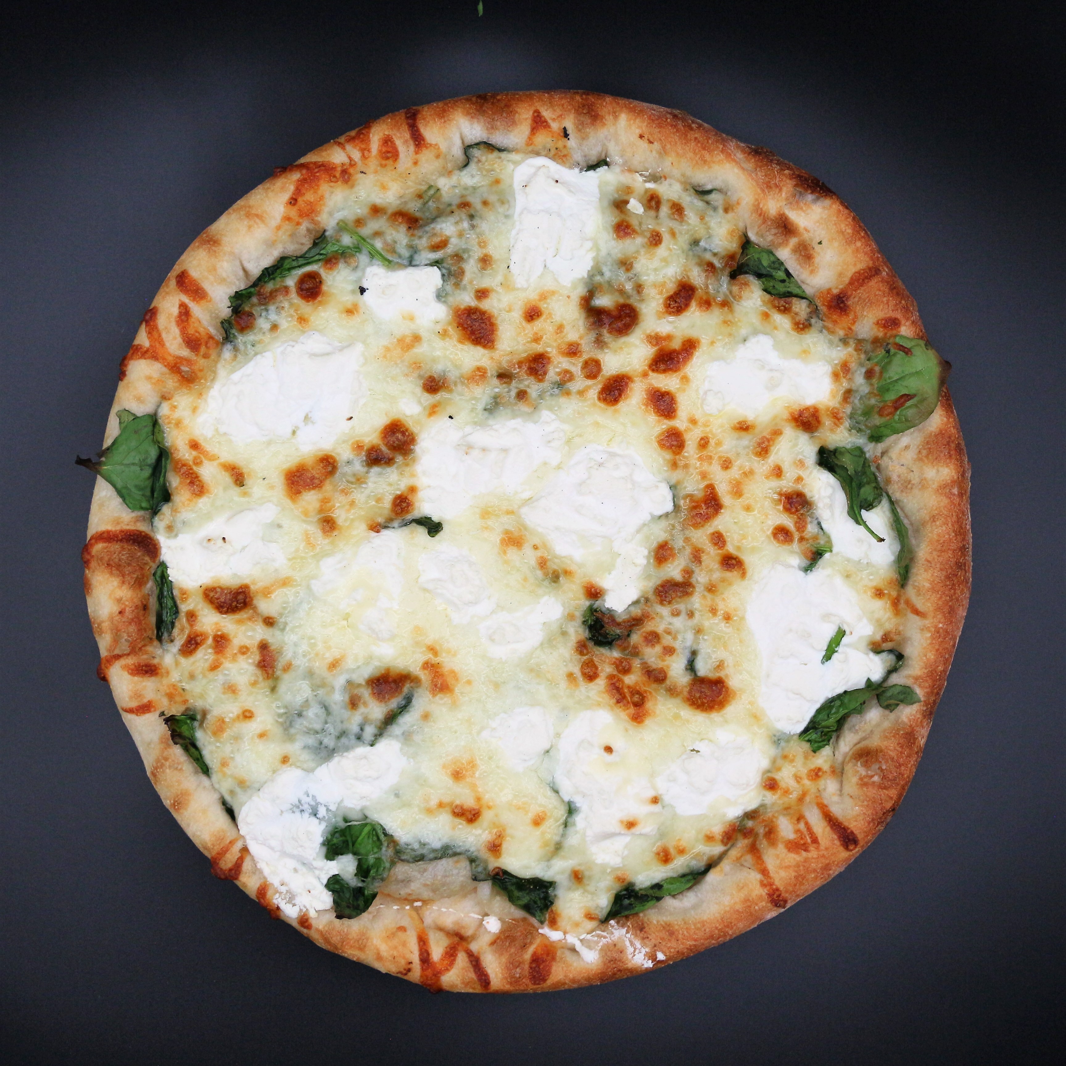Order Spinach White Pizza food online from Mercato Restaurant And Pizzeria store, Delmar on bringmethat.com