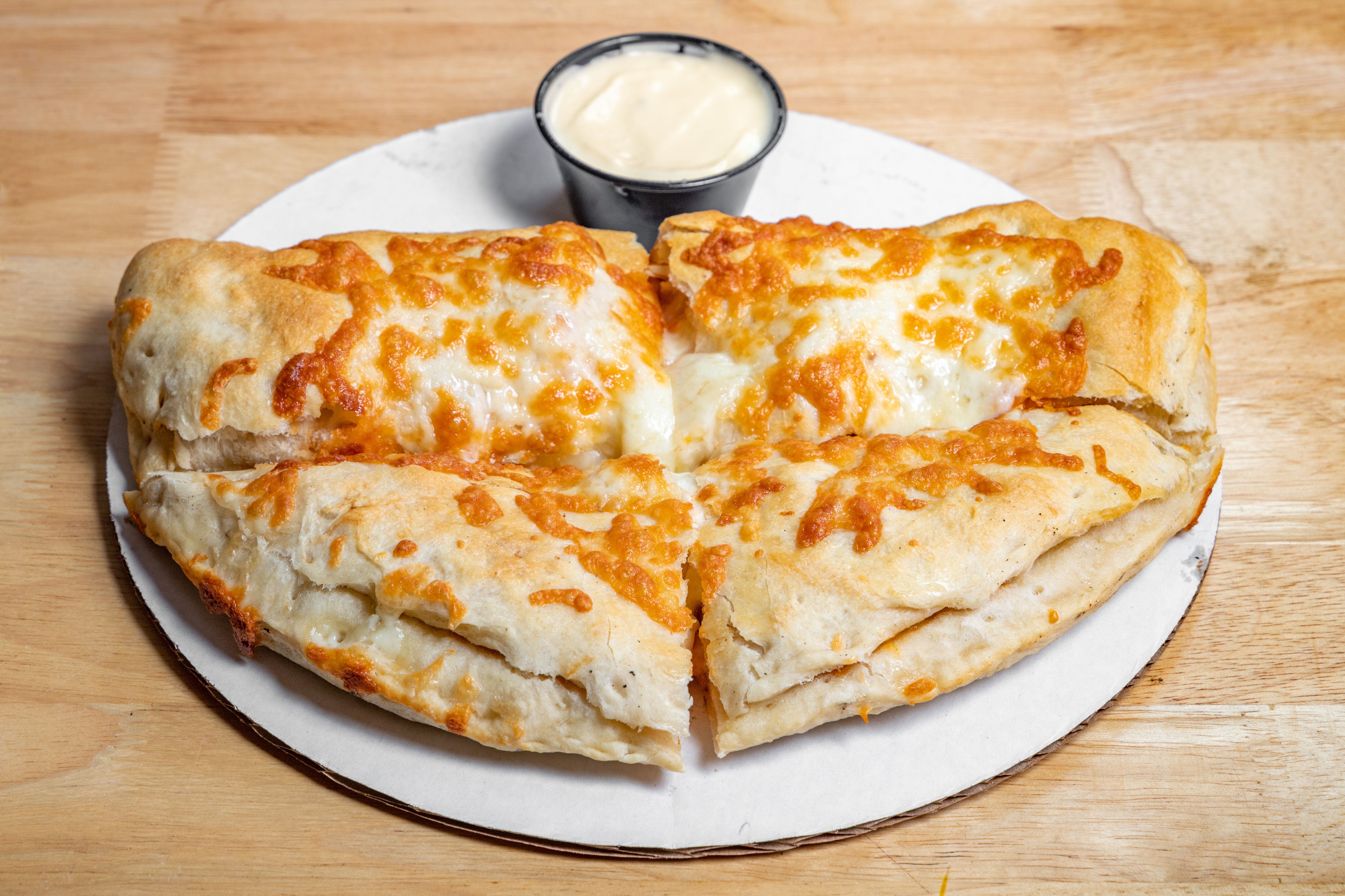 Order Chicken Parmesan Calzone - Small food online from Express Pizza store, Bedford on bringmethat.com
