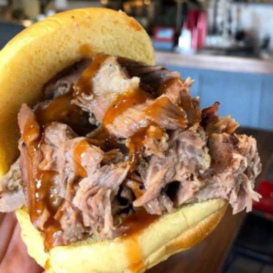 Order Chopped Brisket Sandwich with 1 Side food online from Dixie Q store, Brookhaven on bringmethat.com