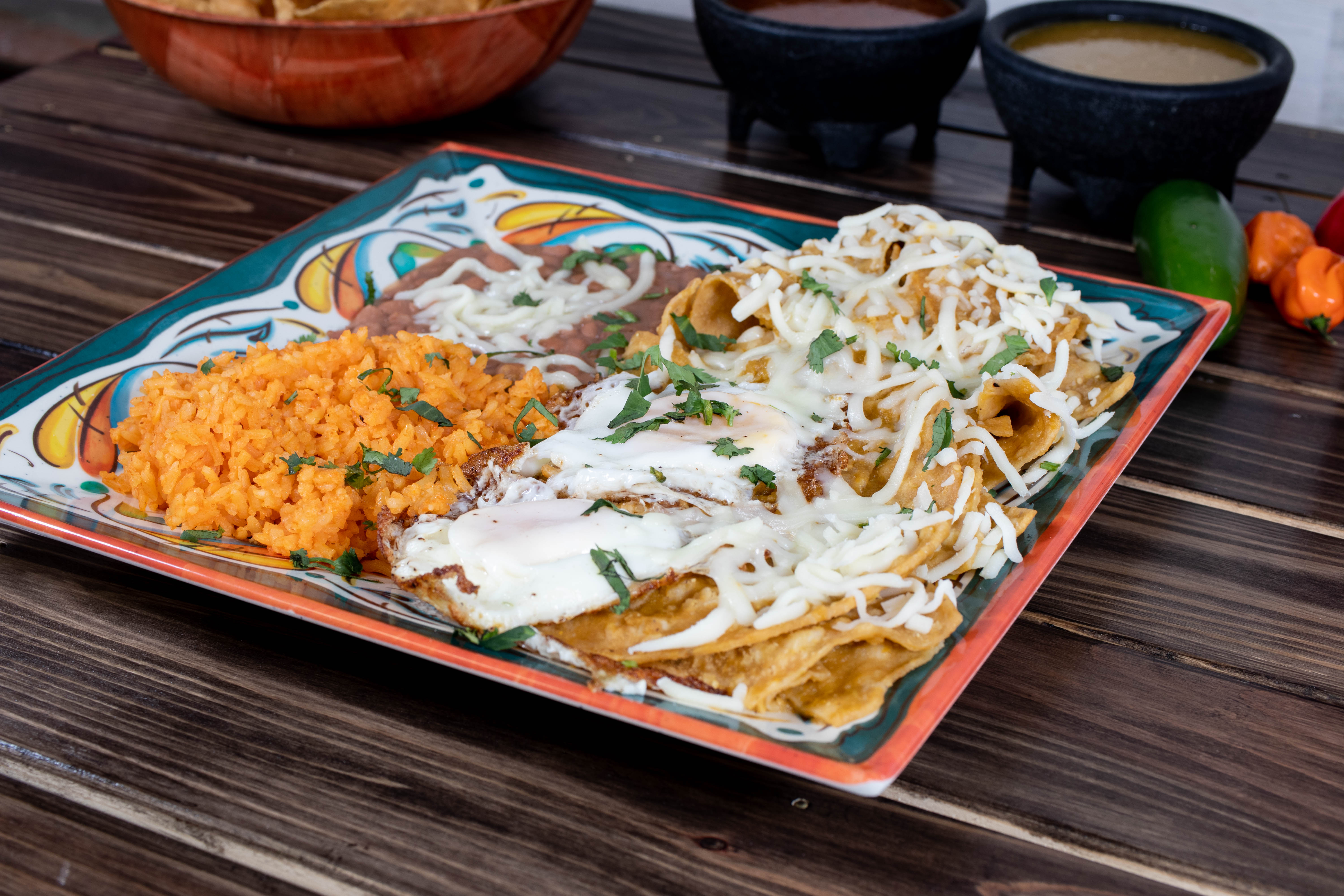 Order Chilaquiles con Carne food online from Rainbow Tacos store, Chicago on bringmethat.com
