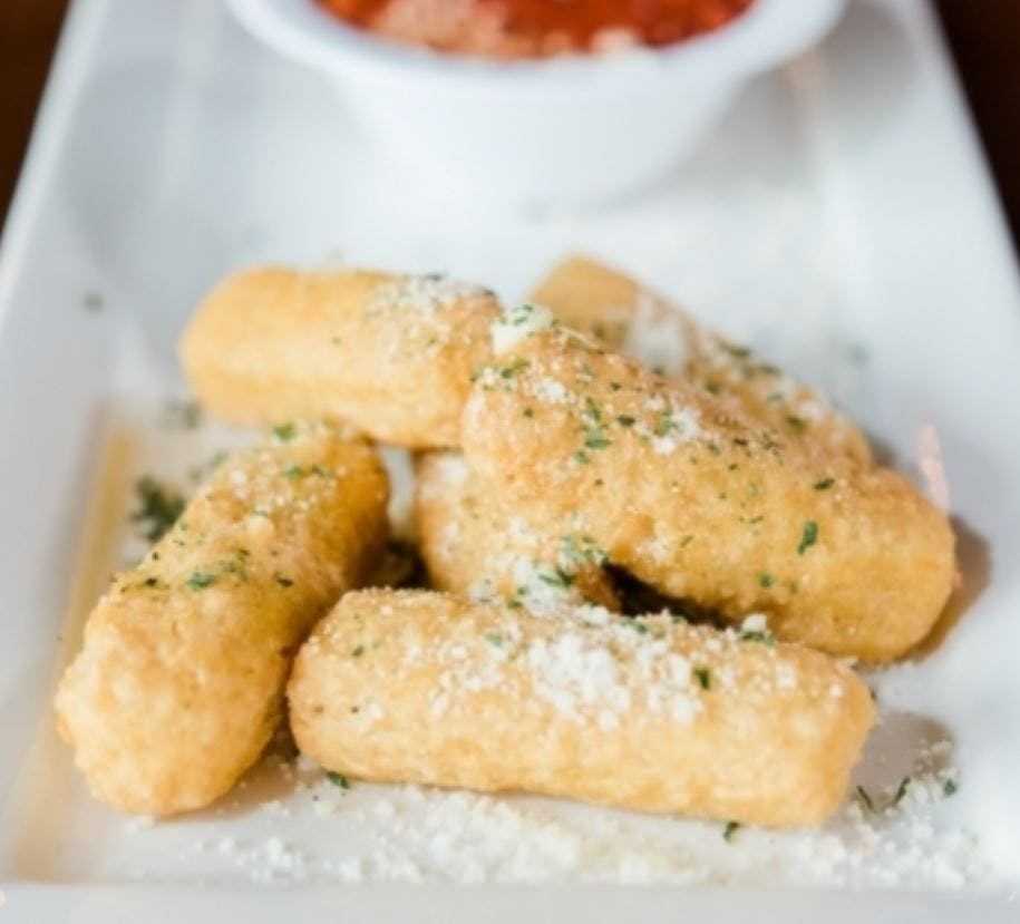 Order Fried Mozzarella Stick - Appetizer food online from Jonny Pizza store, Fort Worth on bringmethat.com