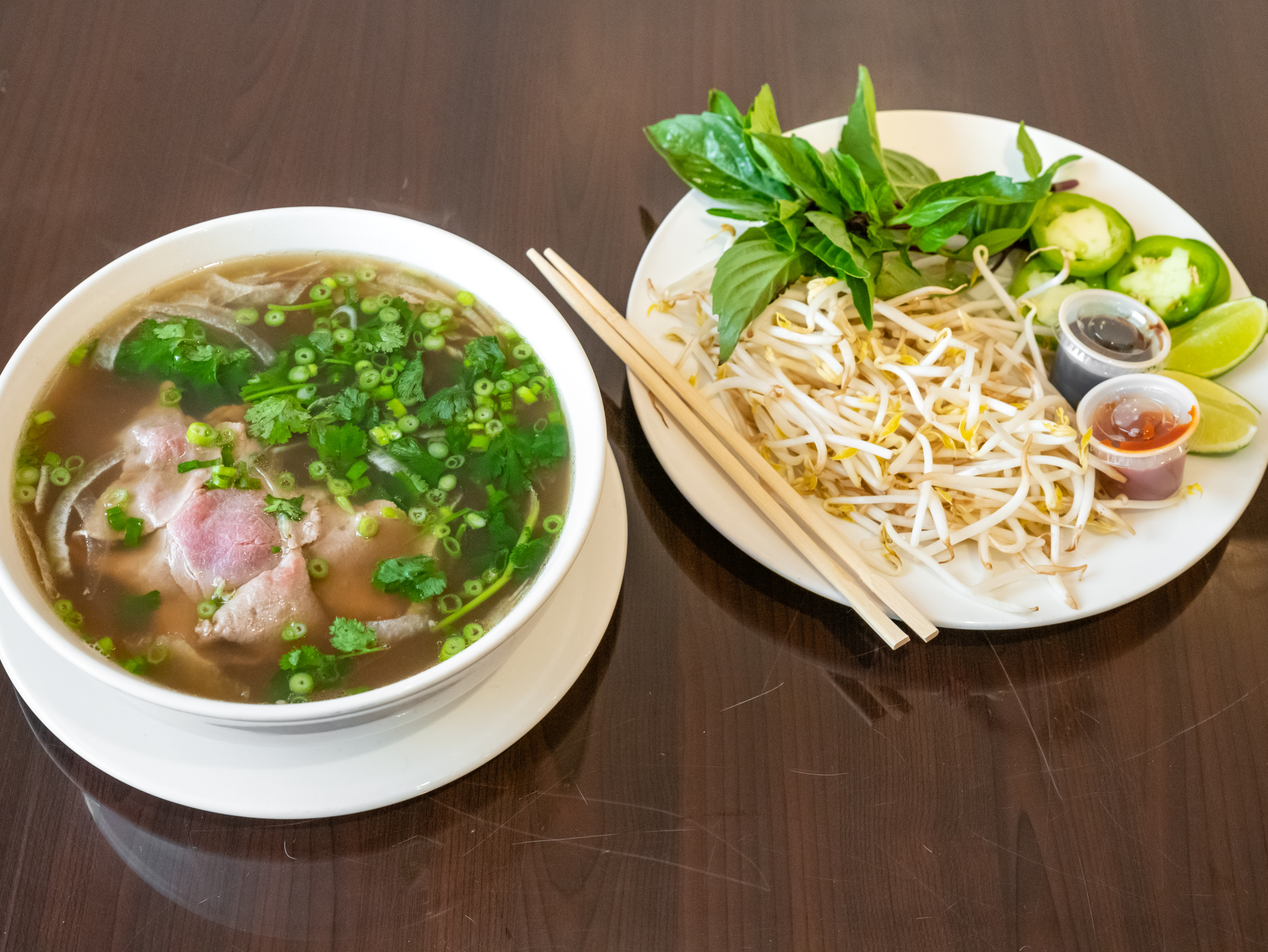 Order Pho Tai, Chin (Rare steak and Brisket) food online from Banh Mi Viet store, Fort Worth on bringmethat.com
