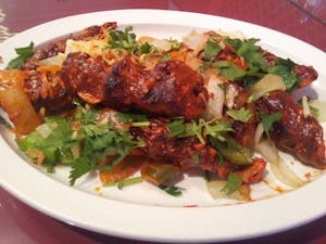 Order 45. Tandoori Chicken food online from New Taj Mahal Indian Restaurant store, Columbus on bringmethat.com
