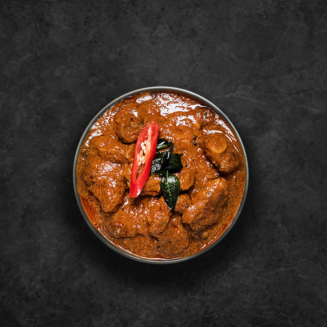 Order United Goat Curry food online from United Kitchens Of India store, Voorhees on bringmethat.com