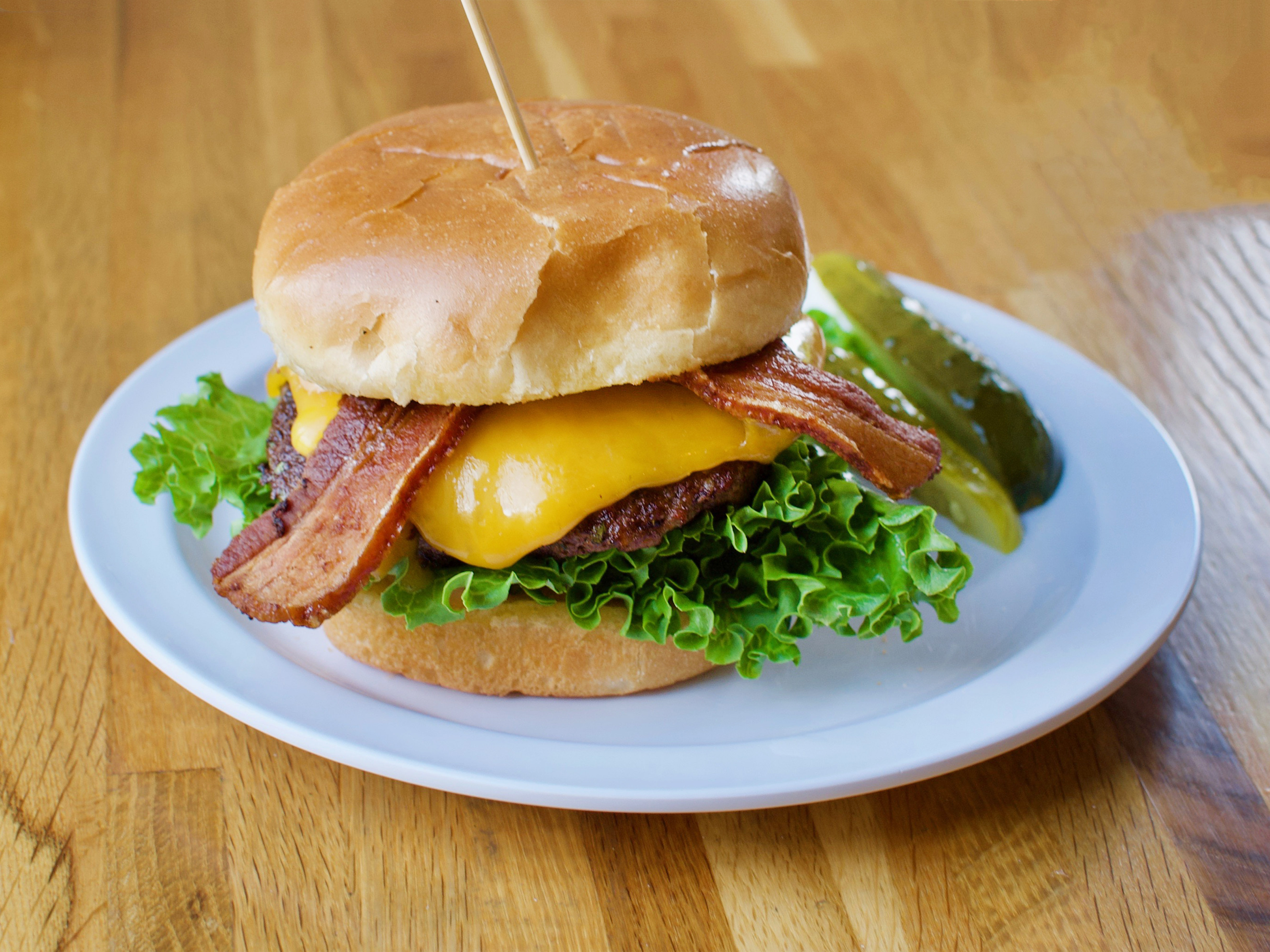 Order Bacon Cheeseburger food online from Burger District store, Arlington on bringmethat.com