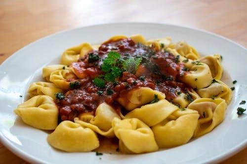Order Cheese Tortellini with Meat Sauce - Dinner food online from Apollo's Family Pizzeria store, Bensalem on bringmethat.com