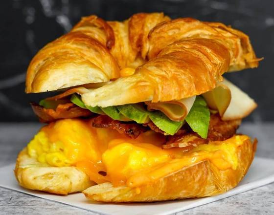 Order Croissant, Bacon, Smoked Turkey, Avocado, Egg, & Cheddar food online from Breakfast in Bed store, Troy on bringmethat.com