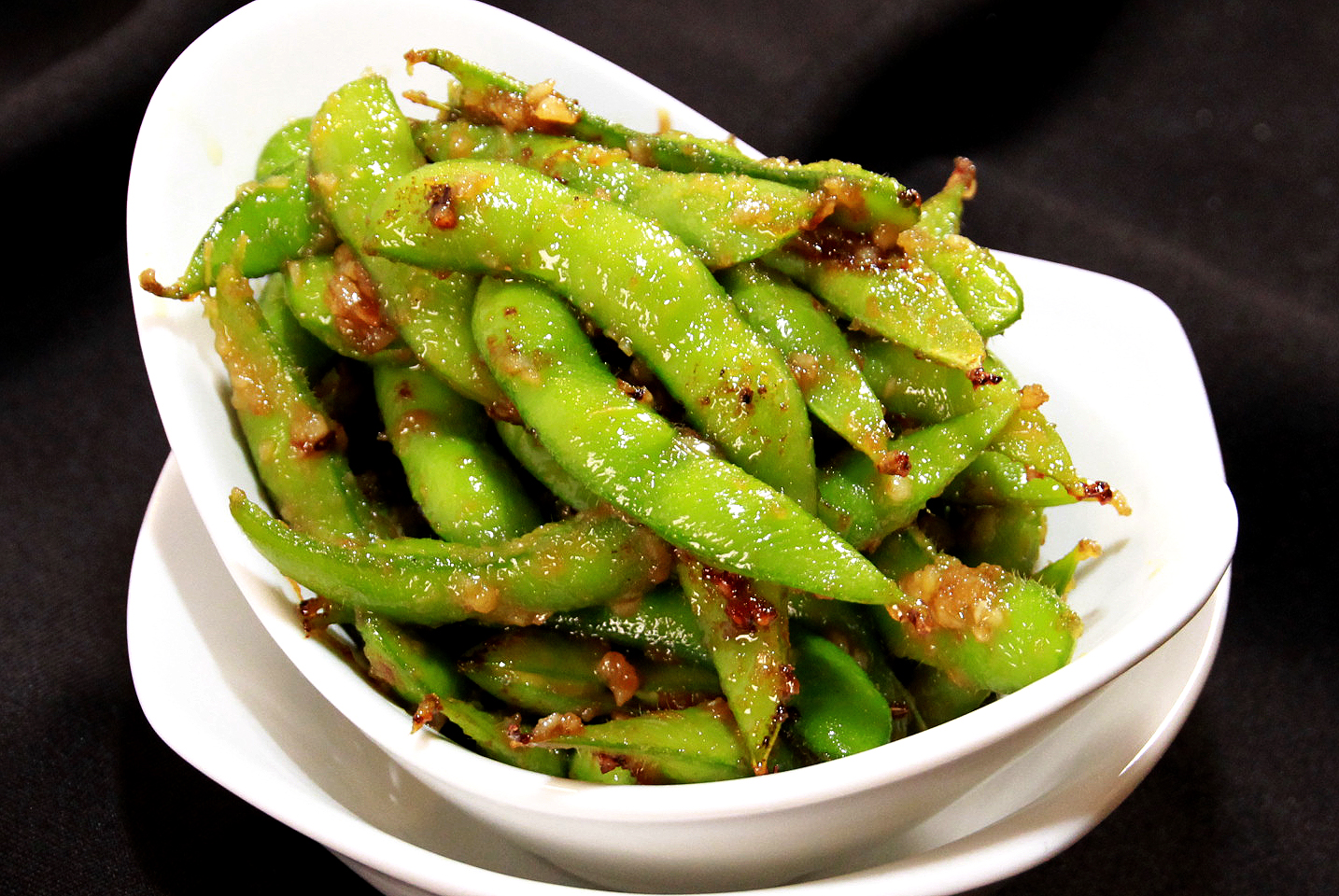 Order Garlic Edamame food online from Tokyo Roll And Noodle store, Chino Hills on bringmethat.com