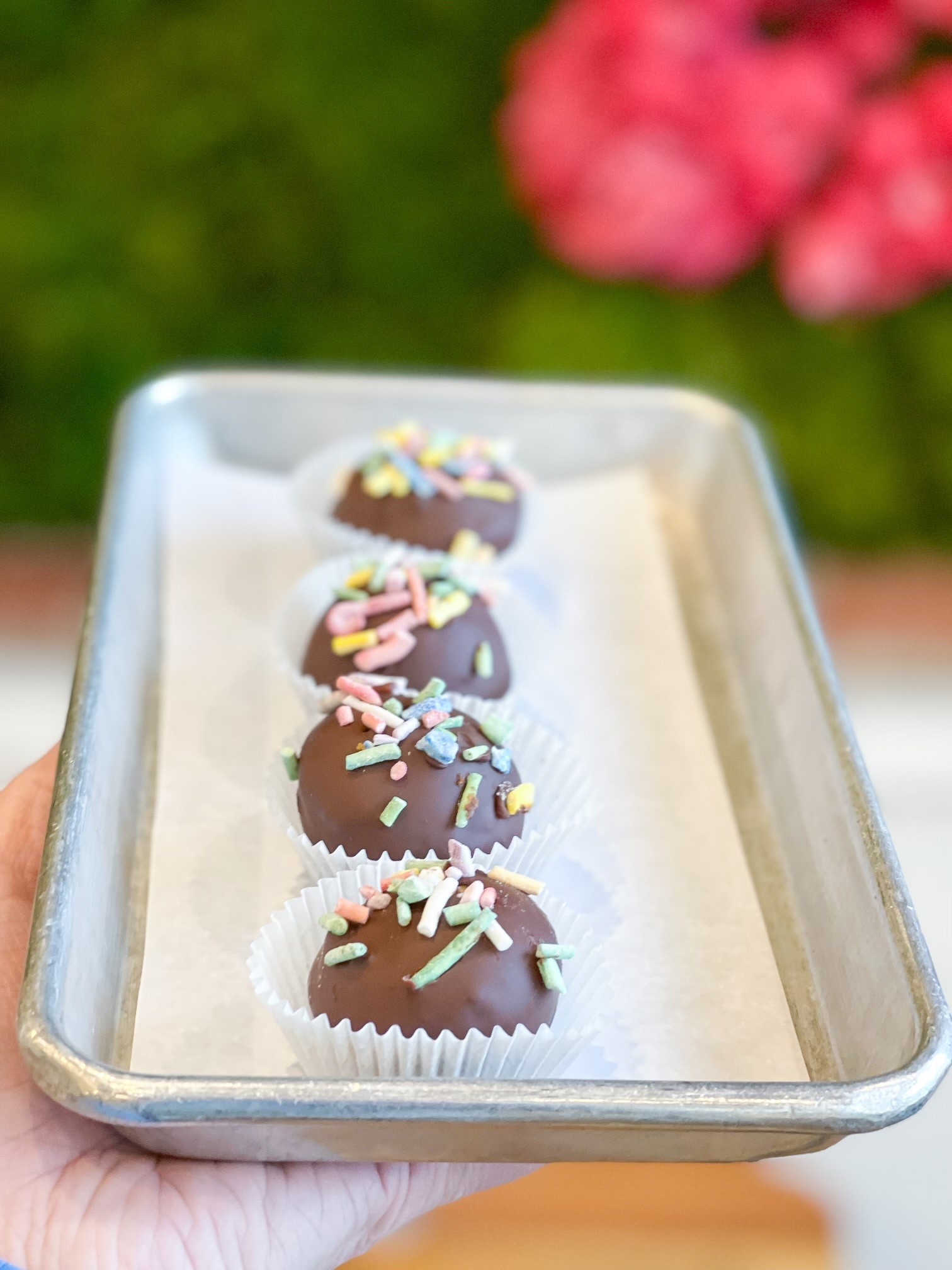 Order Izzi B's Choc-Yellow Cake Donut Holes w/Sprinkles food online from Greenology store, New Canaan on bringmethat.com