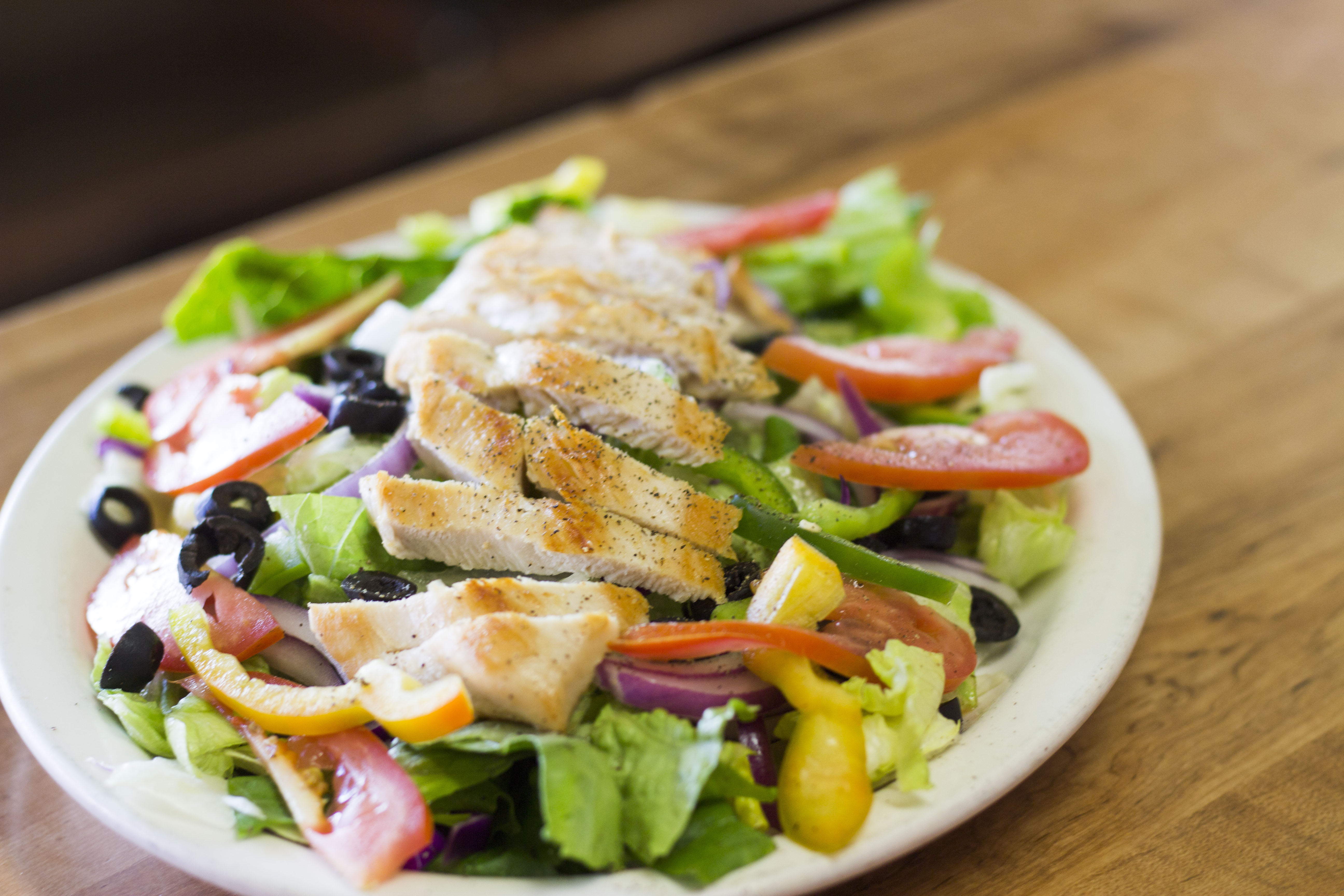 Order Caesar Chicken Salad food online from The Pizza Store store, Placentia on bringmethat.com