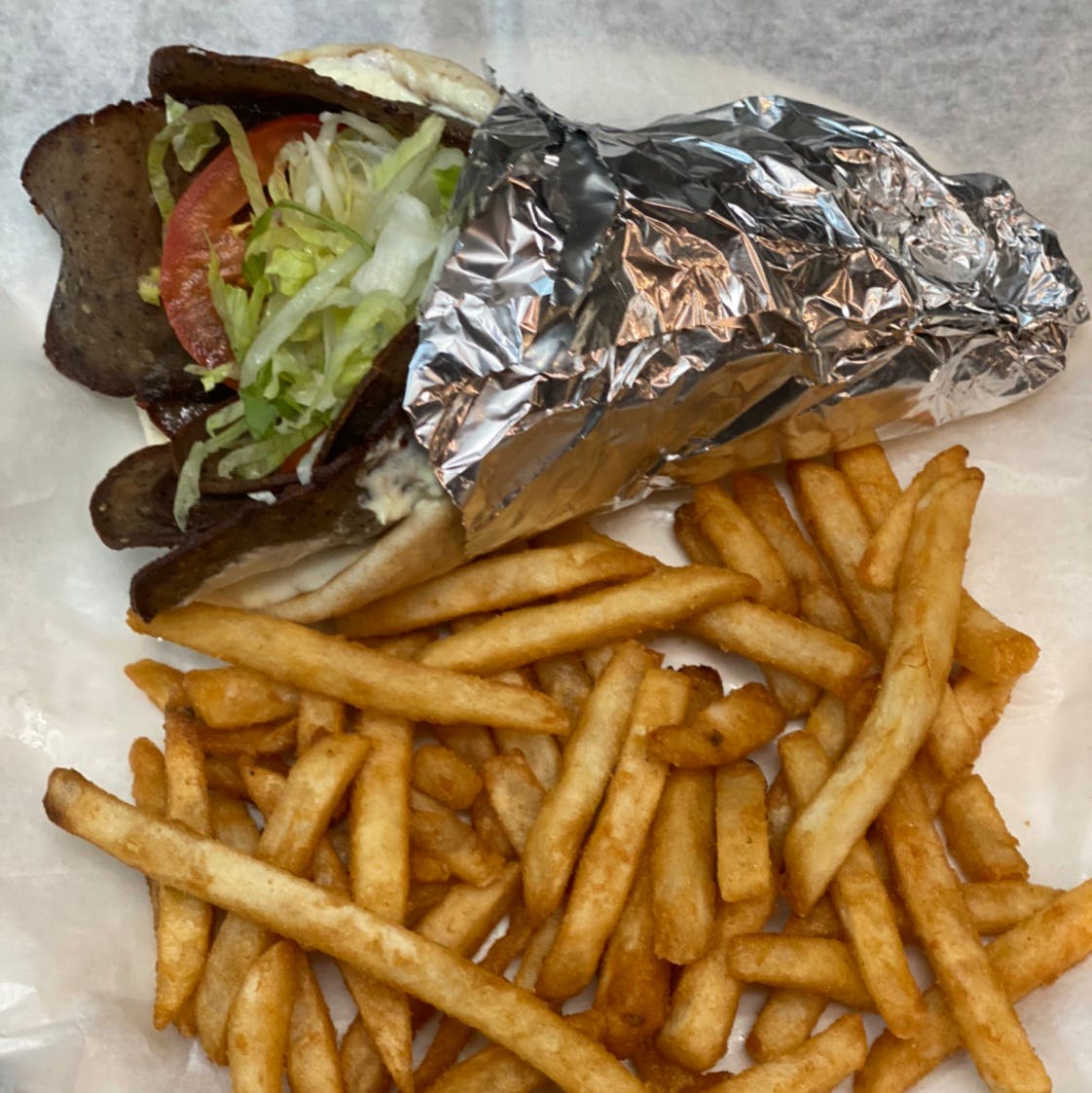 Order Lamb Gyro - 10'' food online from Michelangelo's Pizza store, East Brunswick on bringmethat.com
