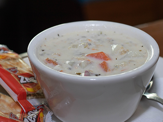 Order New England Clam Chowder - Cup food online from Rockfish Seafood Grill store, McKinney on bringmethat.com