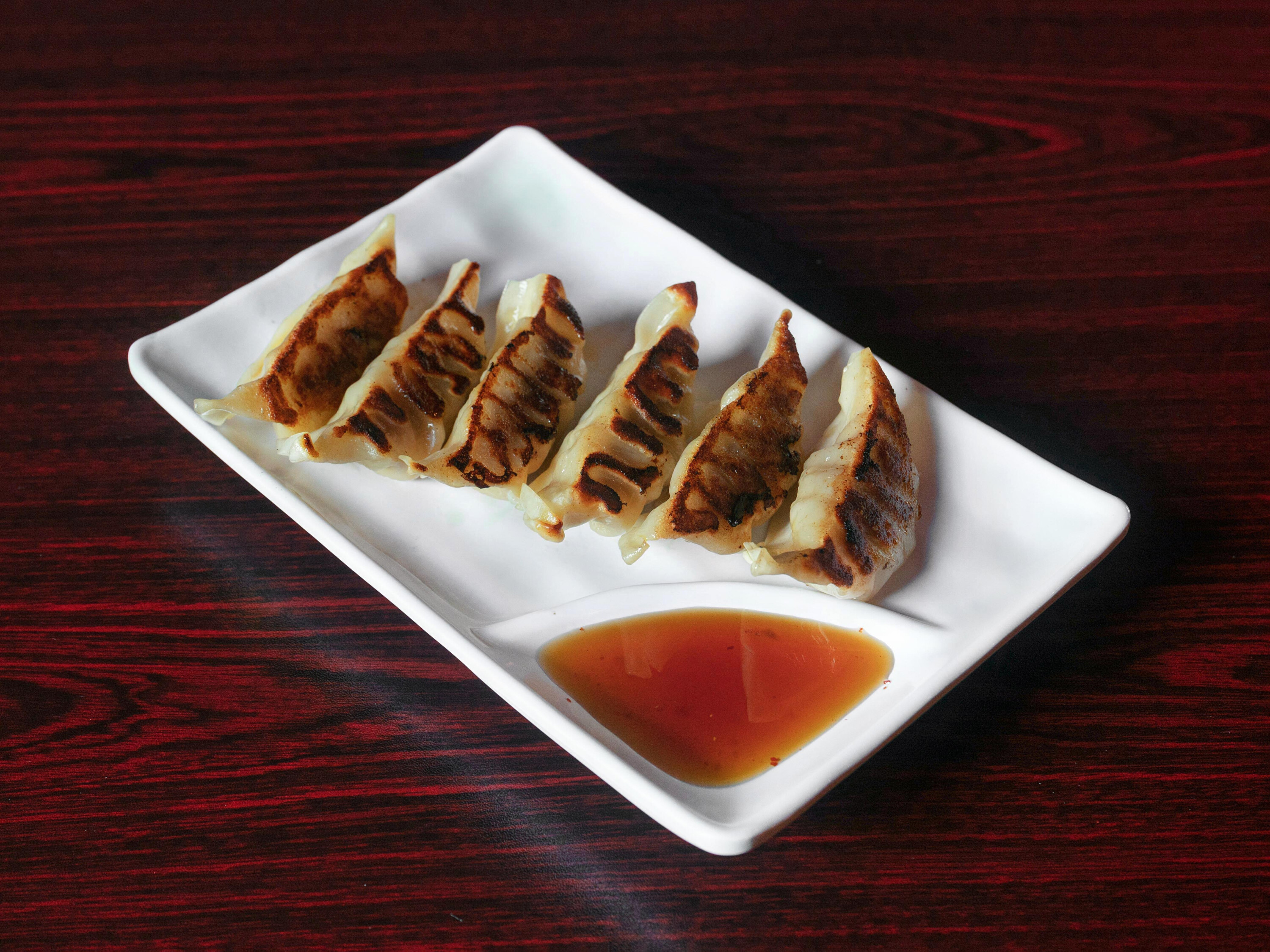 Order A3. Pot Sticker food online from Asahi Japanese Grill store, Lenoir City on bringmethat.com