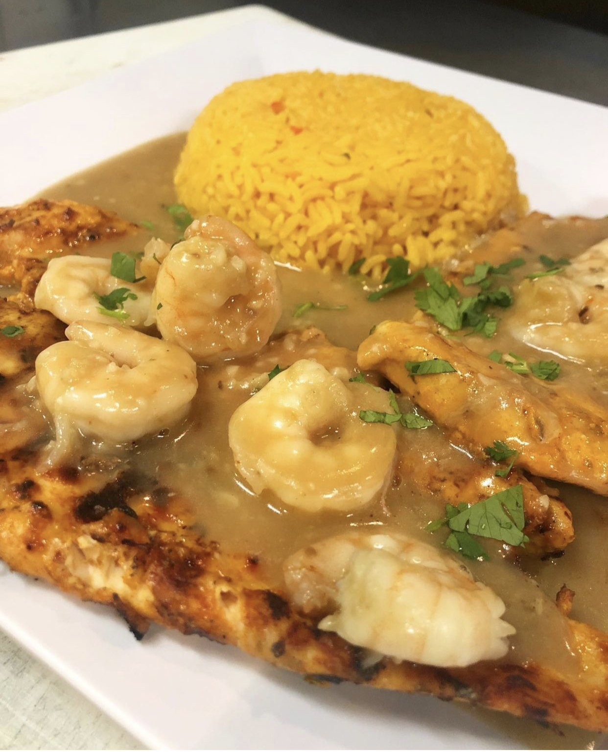 Order Sauteed Chicken Breasts in Garlic Sauce with Shrimp food online from Eurogrill store, Caldwell on bringmethat.com