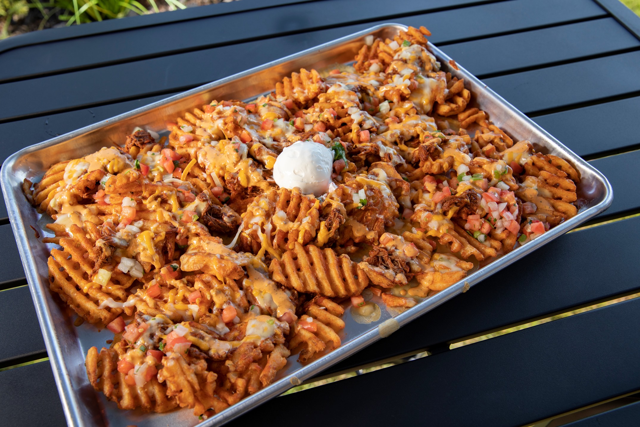 Order Loaded Waffle Fries food online from Ted Tacos & Cantina store, Oklahoma City on bringmethat.com