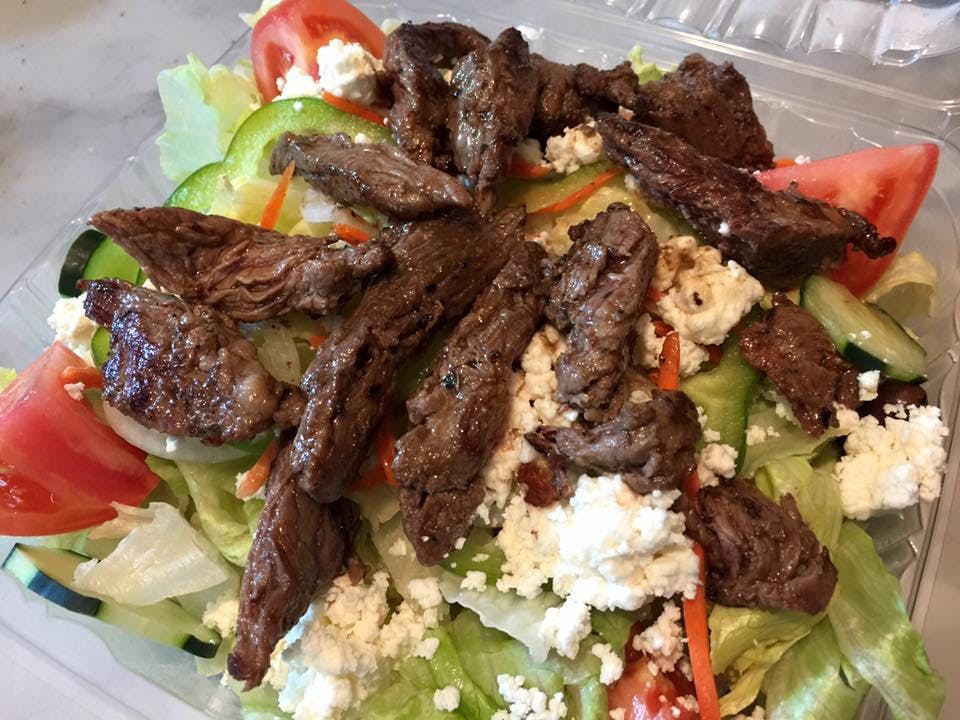 Order Steak Tip Greek Salad - Salad food online from Express Pizza store, Bedford on bringmethat.com