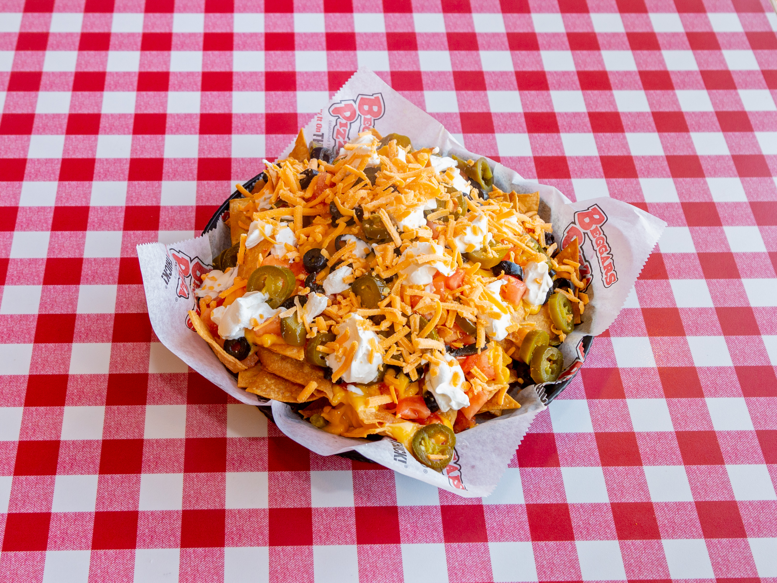 Order Classic Nachos food online from Beggars Pizza store, Blue Island on bringmethat.com